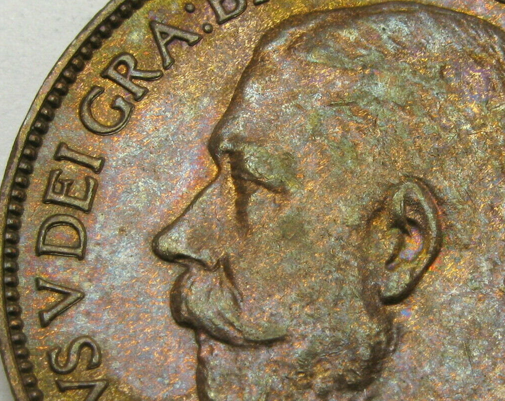 1923-Half-Penny---Repunched-Or-Machine-Doubling?